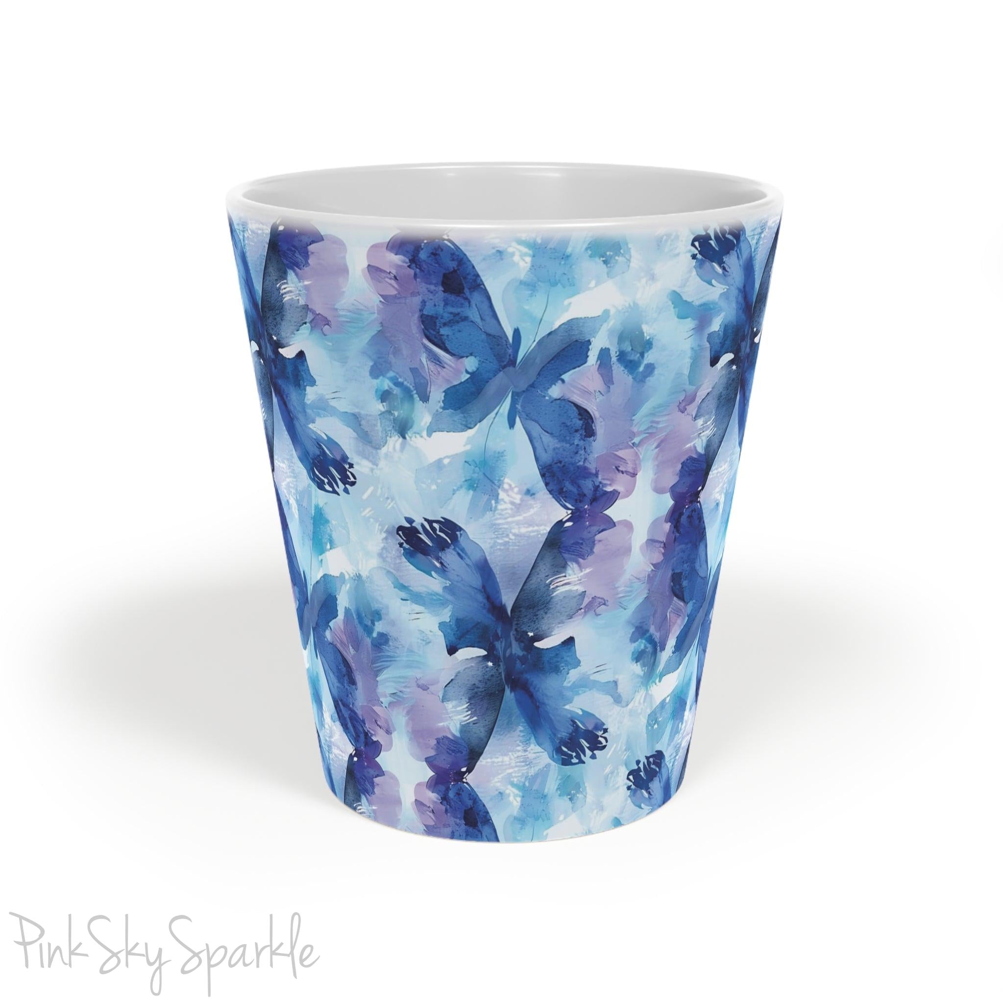 A beautiful 12oz latte mug with a blue and purple abstract watercolor butterfly design.