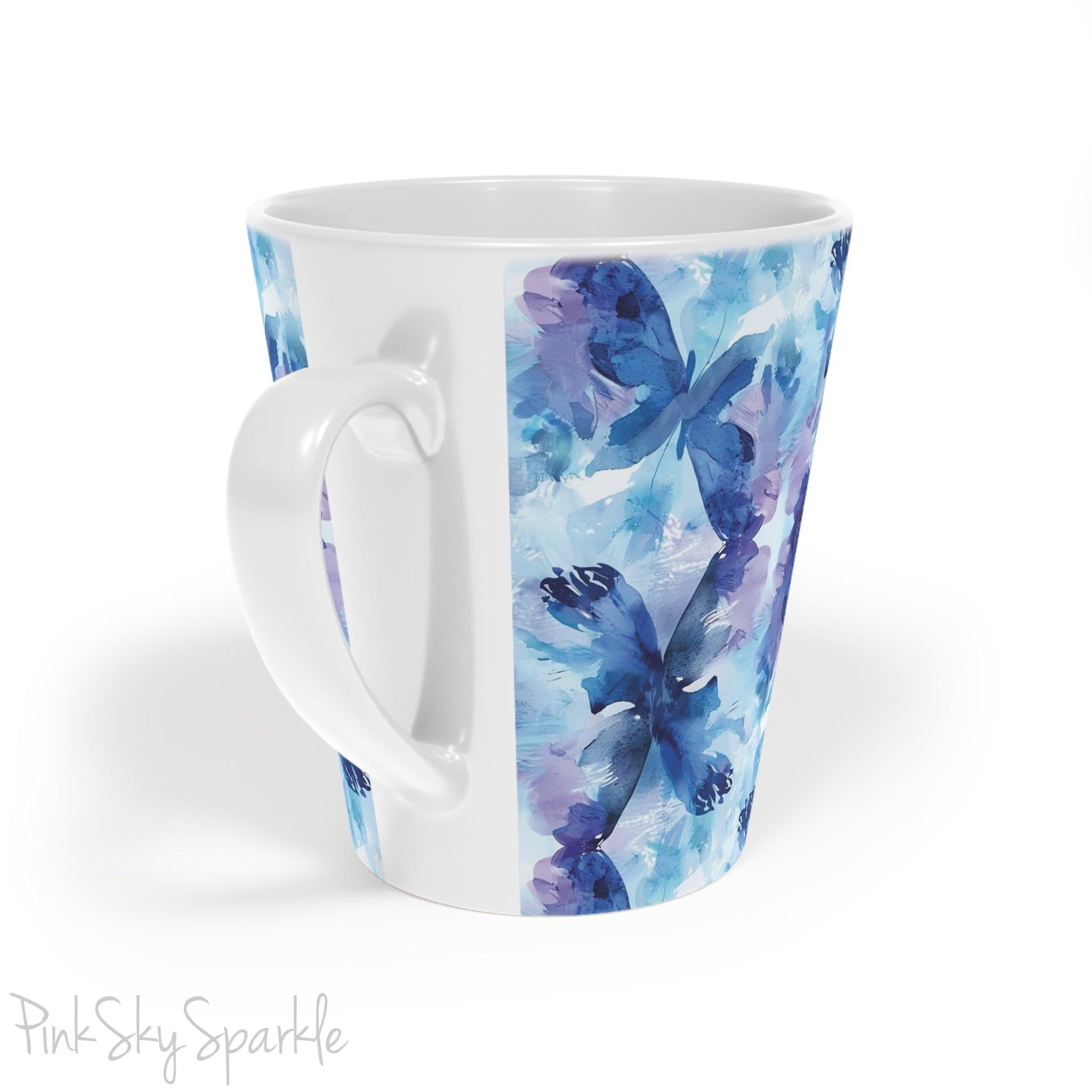 A beautiful 12oz latte mug with a blue and purple abstract watercolor butterfly design.