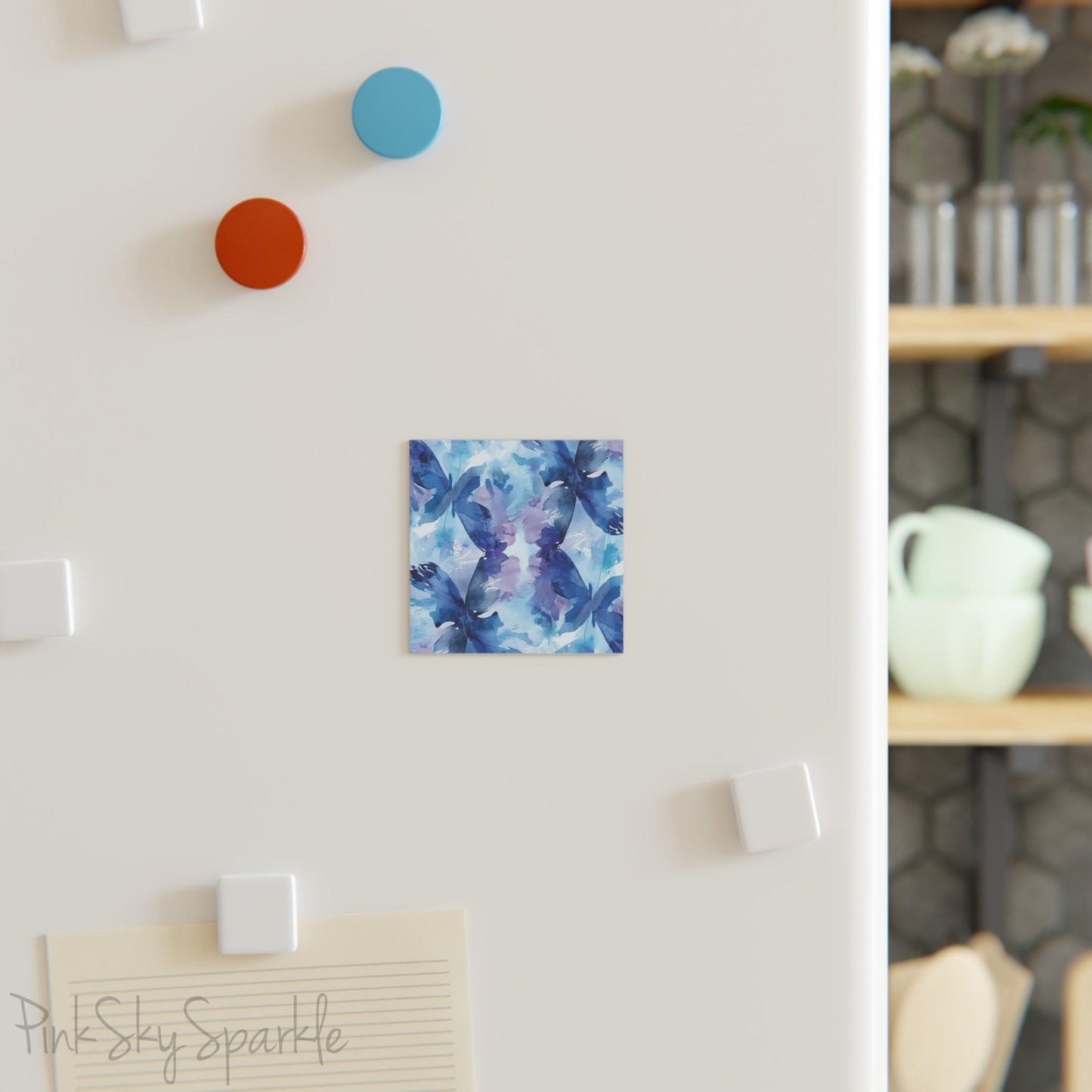 Butterfly Elegance Square Magnet. A square magnet or the refrigerator or any magnetic surface featuring a blue and purple abstract watercolor butterfly design.