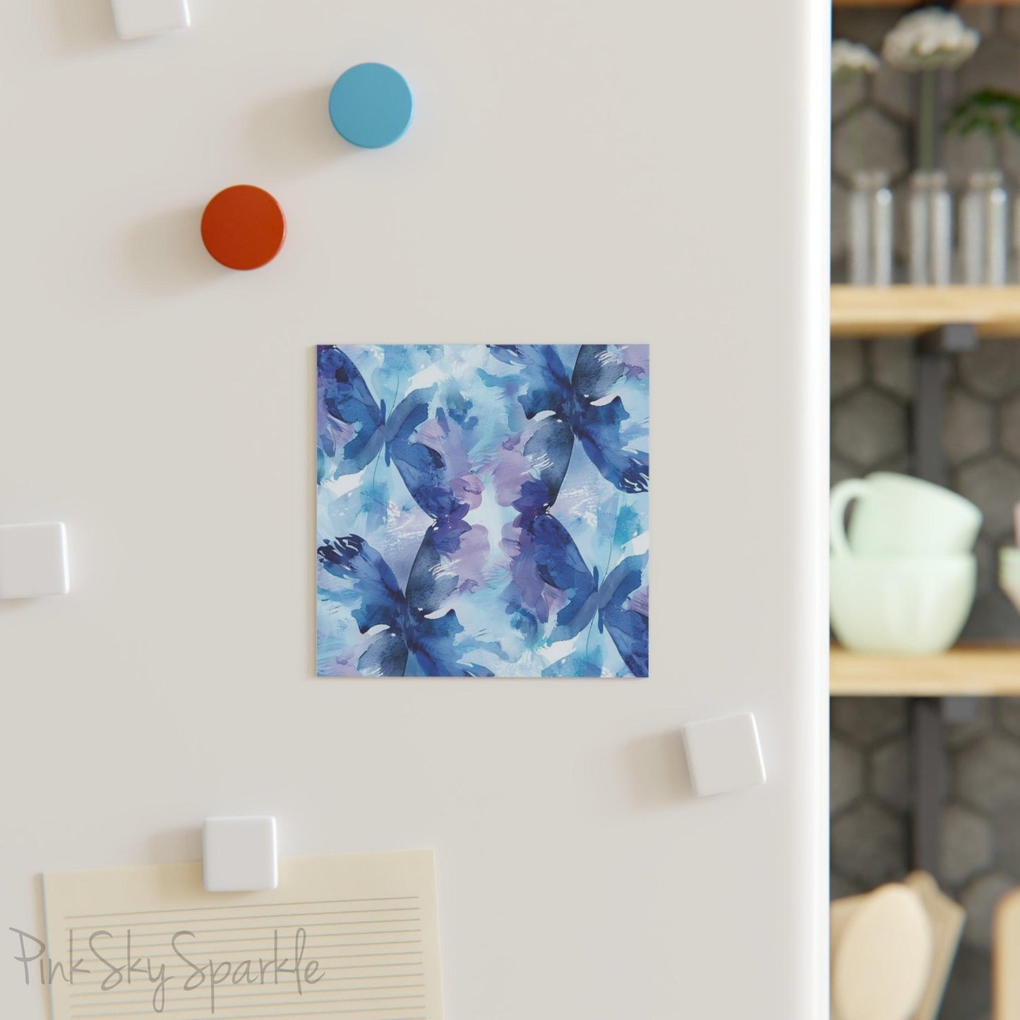 Butterfly Elegance Square Magnet. A square magnet or the refrigerator or any magnetic surface featuring a blue and purple abstract watercolor butterfly design.