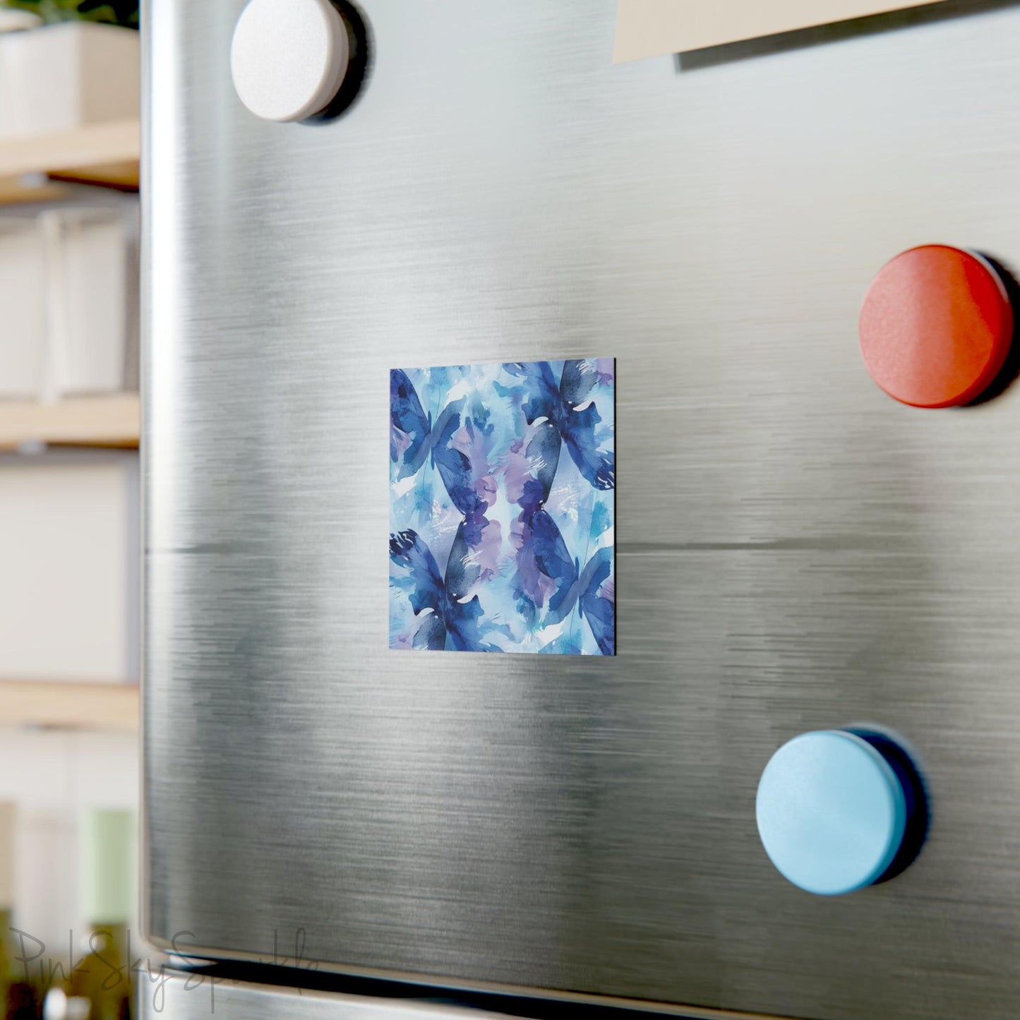 Butterfly Elegance Square Magnet. A square magnet or the refrigerator or any magnetic surface featuring a blue and purple abstract watercolor butterfly design.