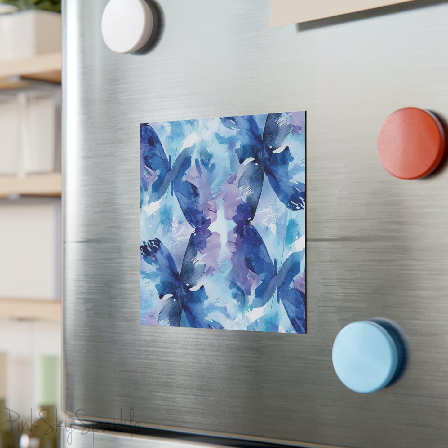 Butterfly Elegance Square Magnet. A square magnet or the refrigerator or any magnetic surface featuring a blue and purple abstract watercolor butterfly design.