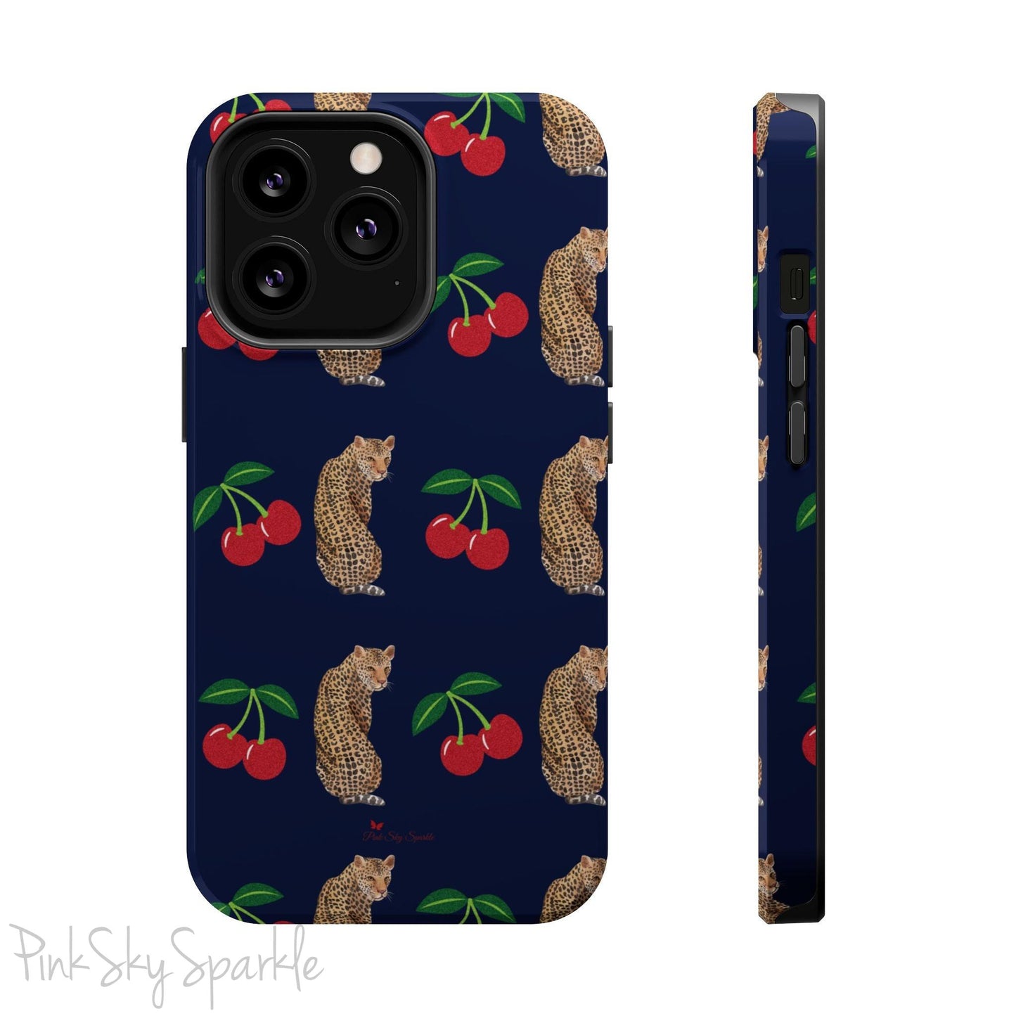 A stylish magnetic iPhone case featuring a unique pattern of leopards and bright red cherries on a dark navy blue background, blending bold and playful elements.