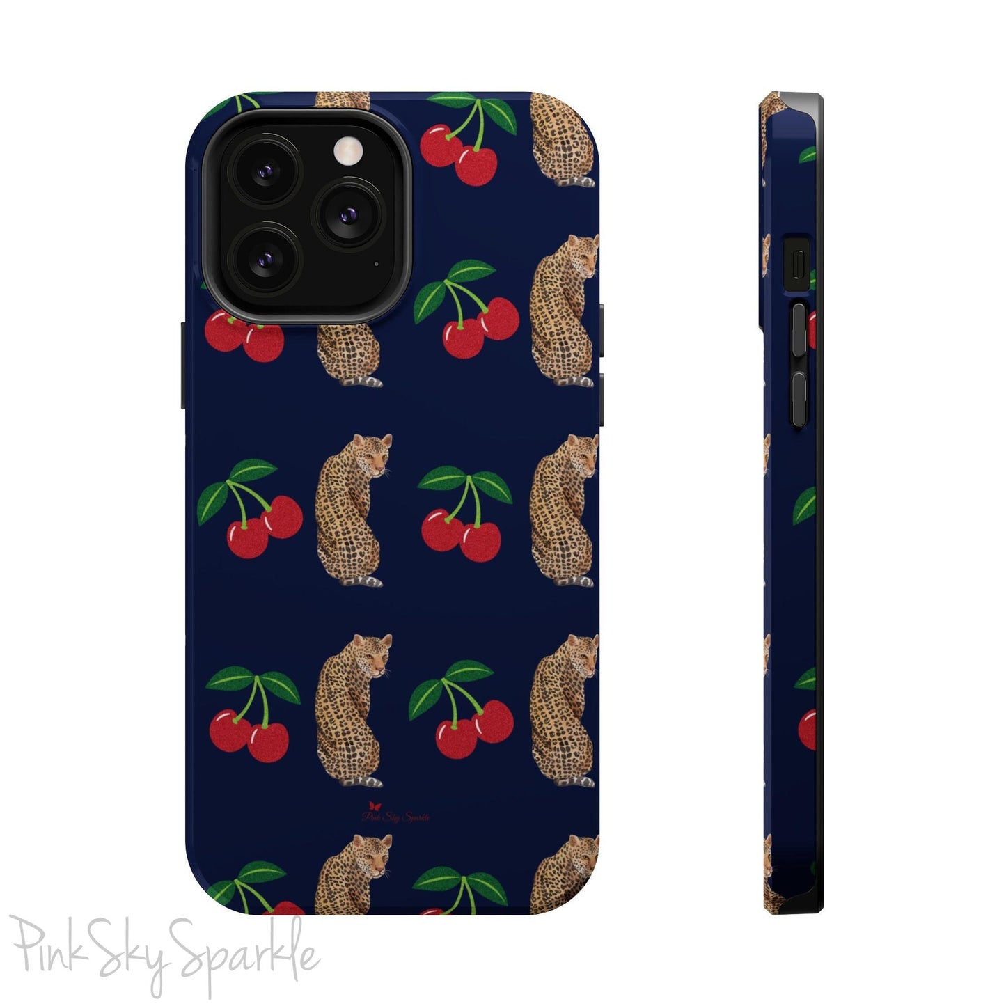 A stylish magnetic iPhone case featuring a unique pattern of leopards and bright red cherries on a dark navy blue background, blending bold and playful elements.