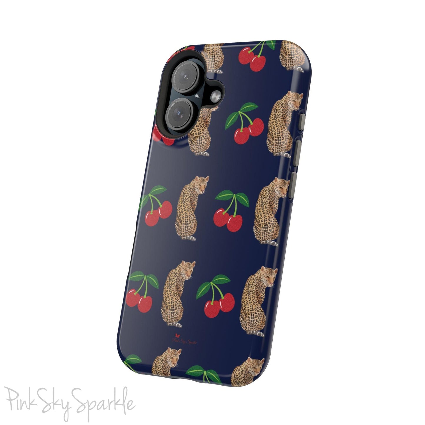 A stylish magnetic iPhone case featuring a unique pattern of leopards and bright red cherries on a dark navy blue background, blending bold and playful elements.