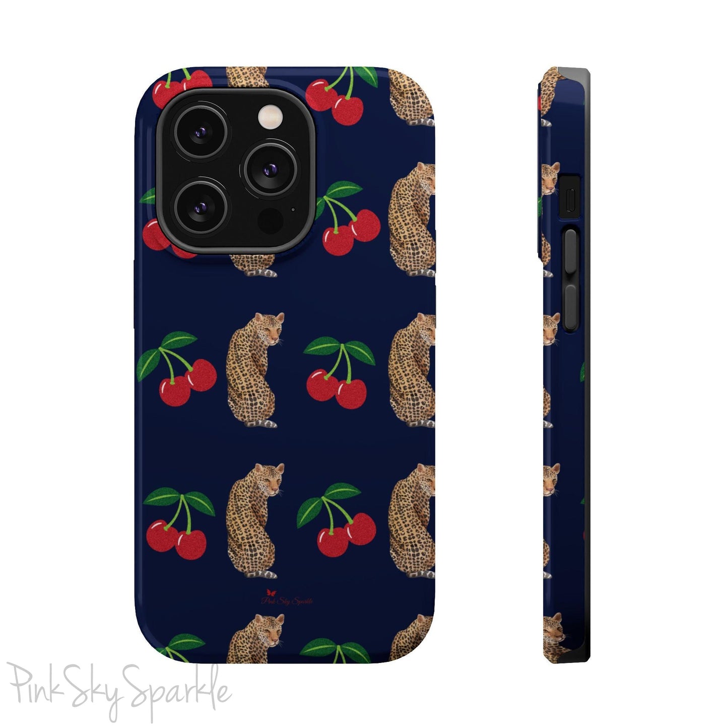 A stylish magnetic iPhone case featuring a unique pattern of leopards and bright red cherries on a dark navy blue background, blending bold and playful elements.