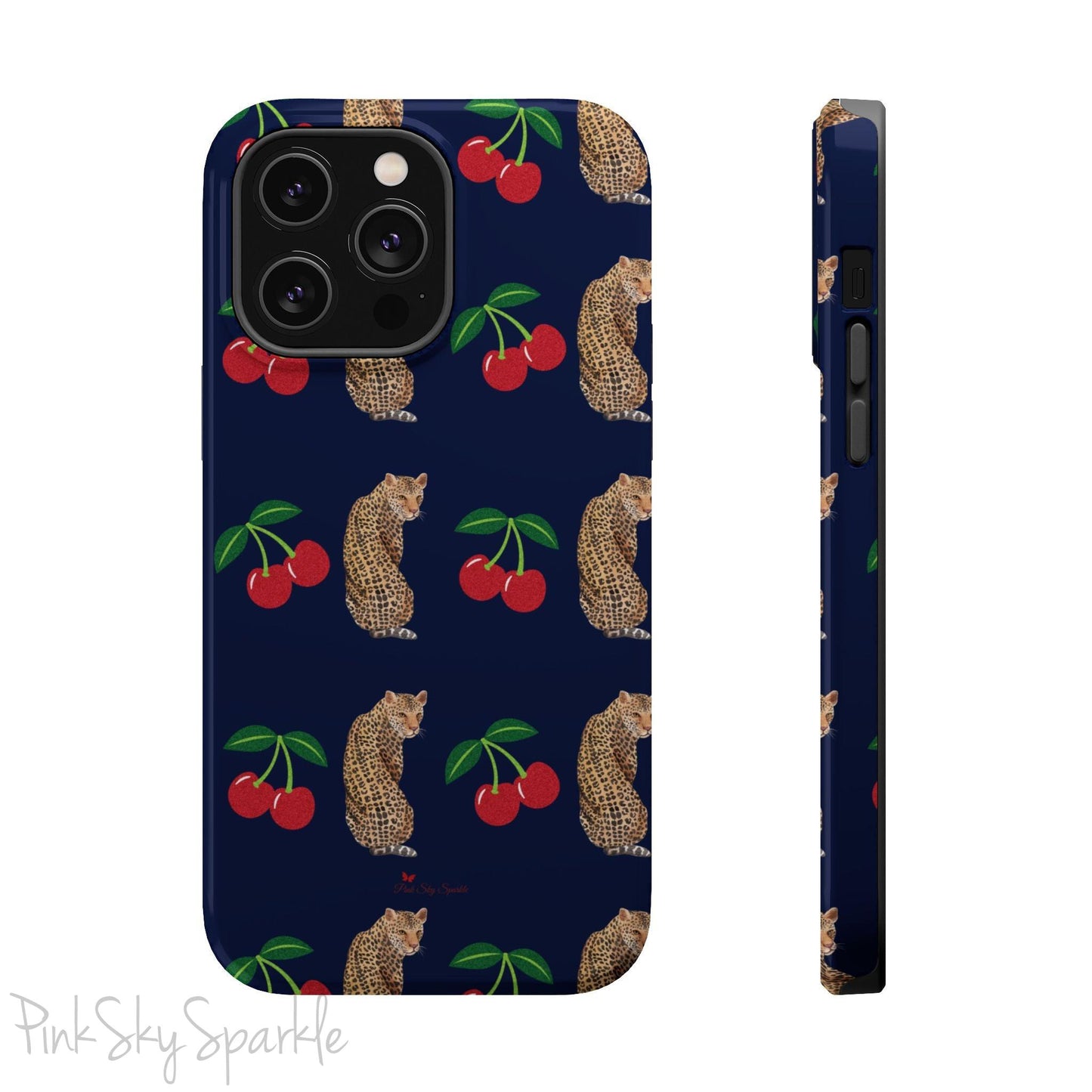 A stylish magnetic iPhone case featuring a unique pattern of leopards and bright red cherries on a dark navy blue background, blending bold and playful elements.