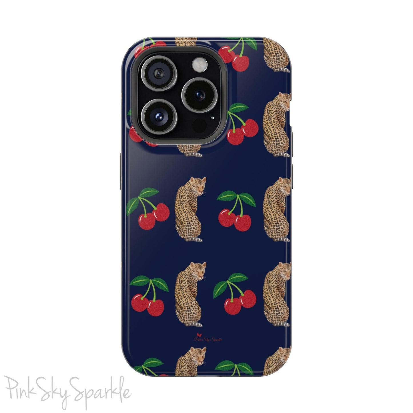 A stylish magnetic iPhone case featuring a unique pattern of leopards and bright red cherries on a dark navy blue background, blending bold and playful elements.