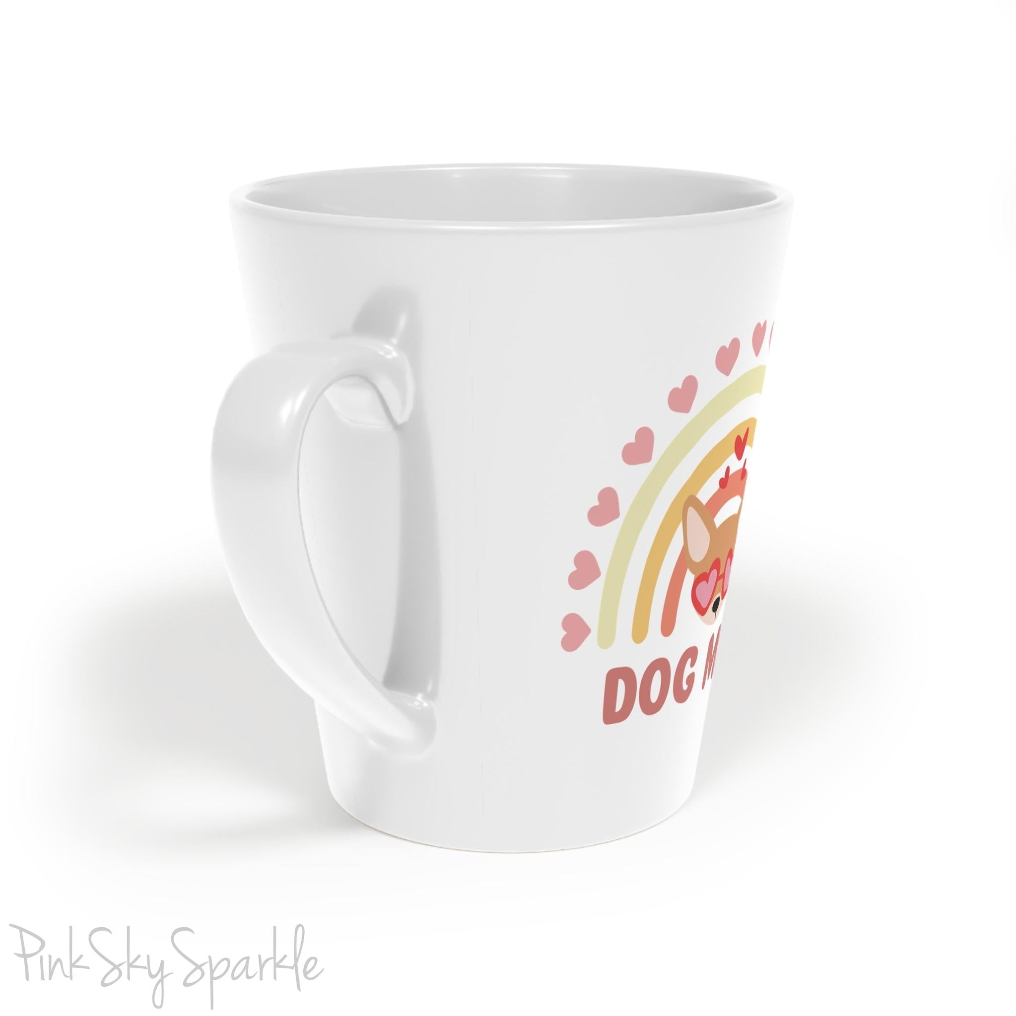 Dog Mom, Rainbow & Hearts Latte Mug. A white 12oz latte mug featuring a boho style rainbow with hearts and a chihuahua wearing heart shaped glasses in the center and the words Dog Mom written in all caps below it.