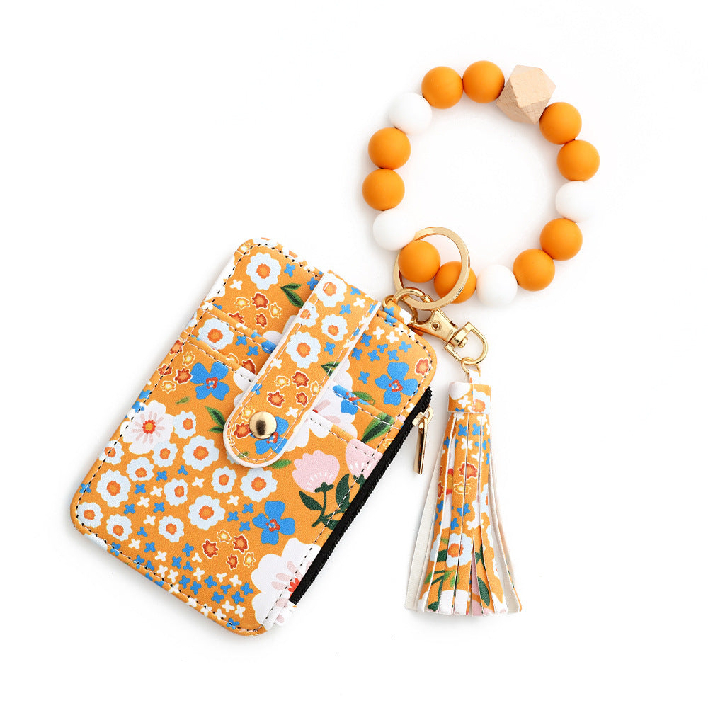 floral wristlet card holder with beaded keychain, tassel, and zipper pocket – compact wallet for women