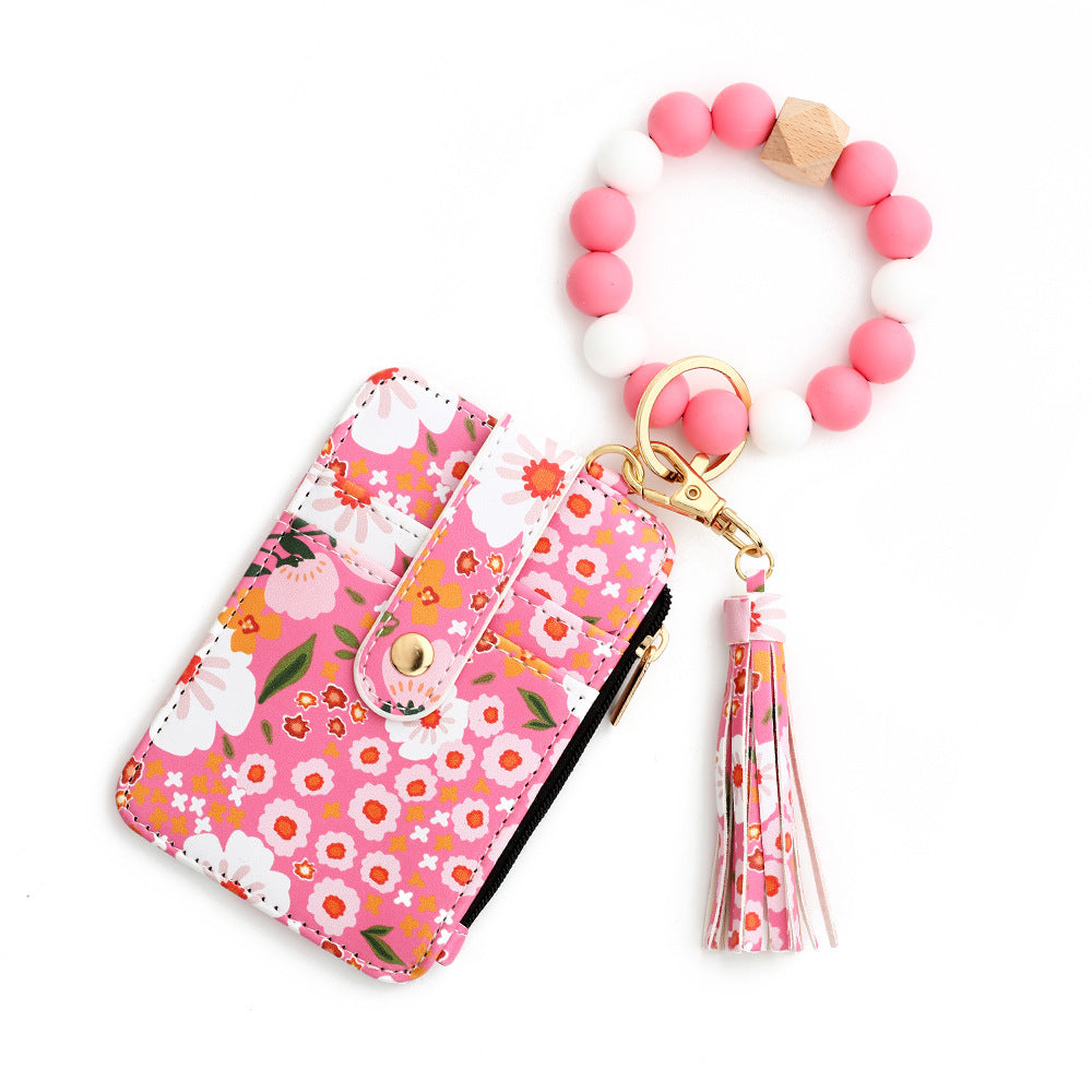 floral wristlet card holder with beaded keychain, tassel, and zipper pocket – compact wallet for women