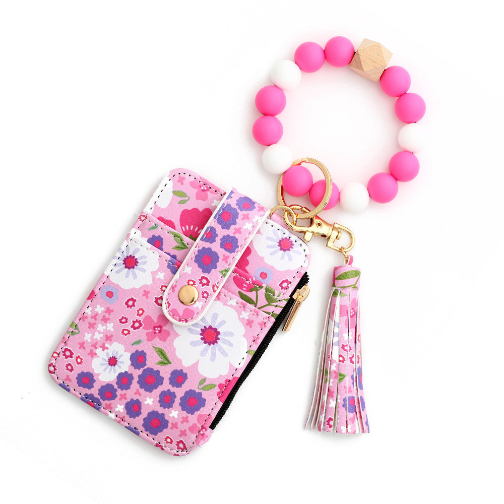 floral wristlet card holder with beaded keychain, tassel, and zipper pocket – compact wallet for women