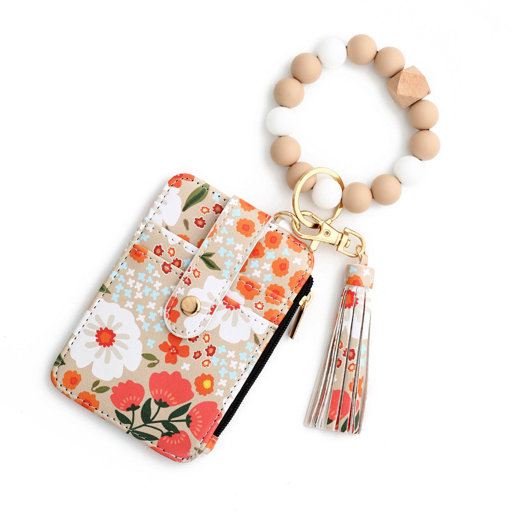 floral wristlet card holder with beaded keychain, tassel, and zipper pocket – compact wallet for women