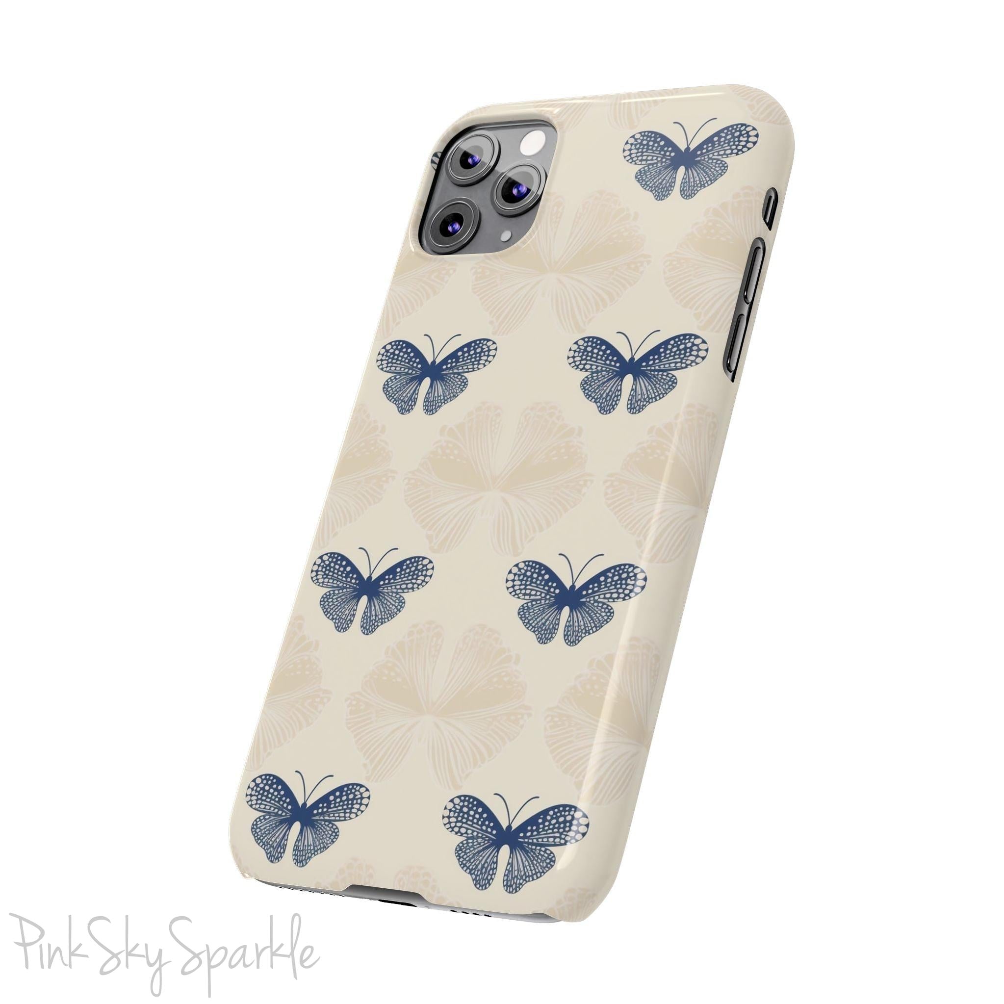 Add a touch of elegance to your phone with the Midnight Flutter Slim iPhone Case. Featuring a neutral background and navy blue butterflies.