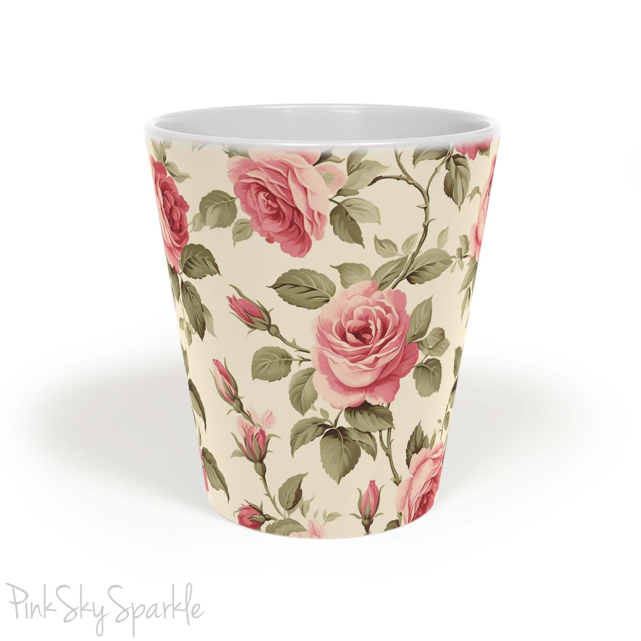 Rose Garden Latte Mug. A white mug with a rose vine print on an ivory coloured background.