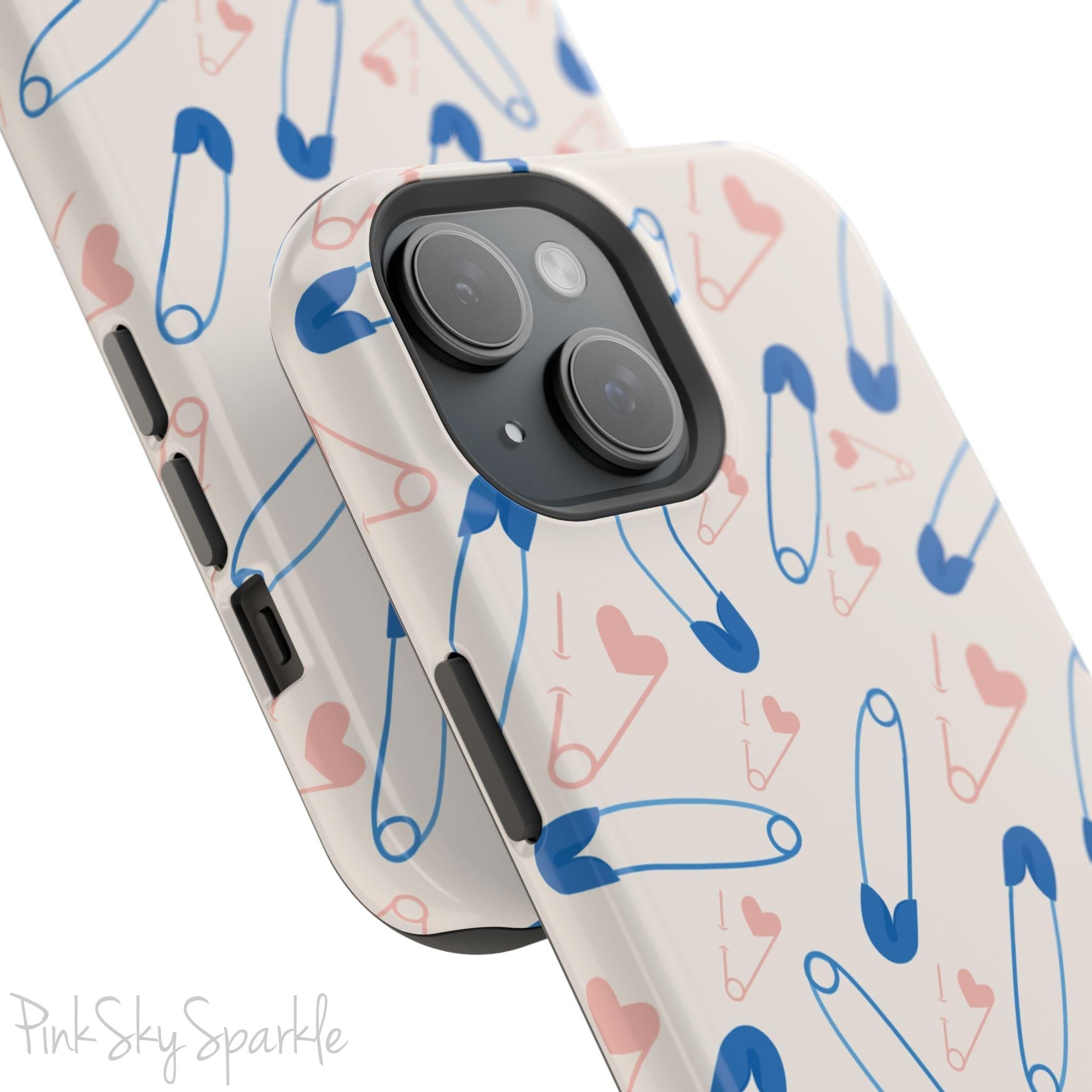 Make a statement with the Safety Pin Magnetic iPhone Case. Featuring a sleek design of blue safety pins, this case adds unique flair while providing durable protection for iPhone models 13, 14, 15, and 16.