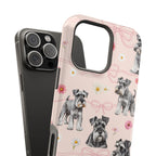 Daisy Dog Magnetic iPhone Case featuring Schnauzer and pink floral pattern.