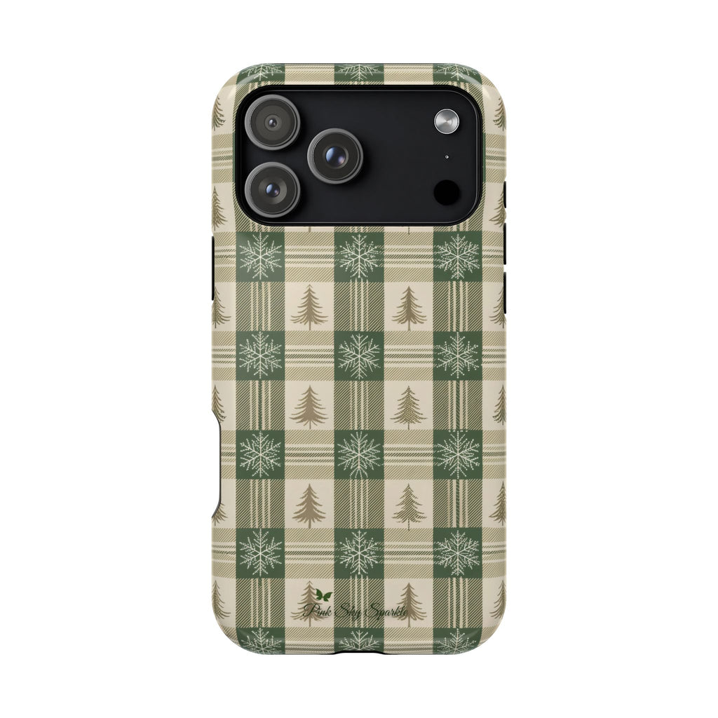 Phone case with plaid pattern featuring trees and snowflakes on a white background