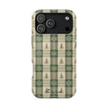 Phone case with plaid pattern featuring trees and snowflakes on a white background