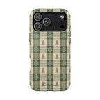 Phone case with plaid pattern featuring trees and snowflakes on a white background