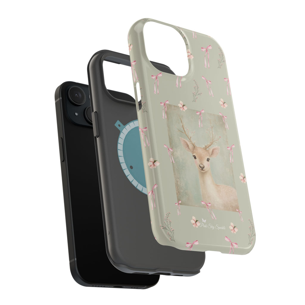 Pastel green magnetic iPhone case with pink bows and a framed woodland fawn painting in the center, cute cottagecore MagSafe-friendly phone case design by Pink Sky Sparkle.