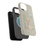 Pastel green magnetic iPhone case with pink bows and a framed woodland fawn painting in the center, cute cottagecore MagSafe-friendly phone case design by Pink Sky Sparkle.