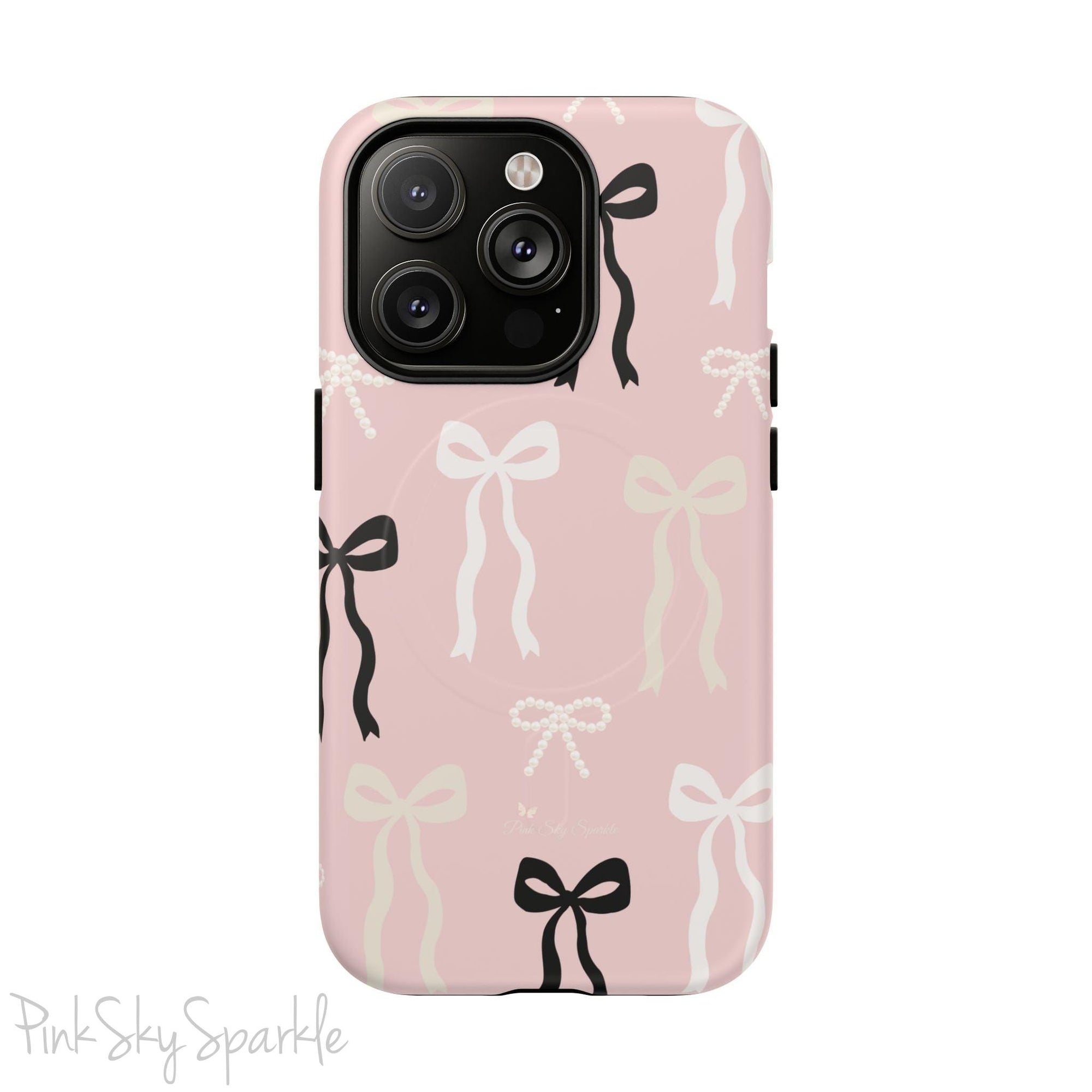 Pink magnetic iPhone case featuring an elegant bow pattern with black, white, and cream bows, designed for MagSafe® compatibility and premium protection.