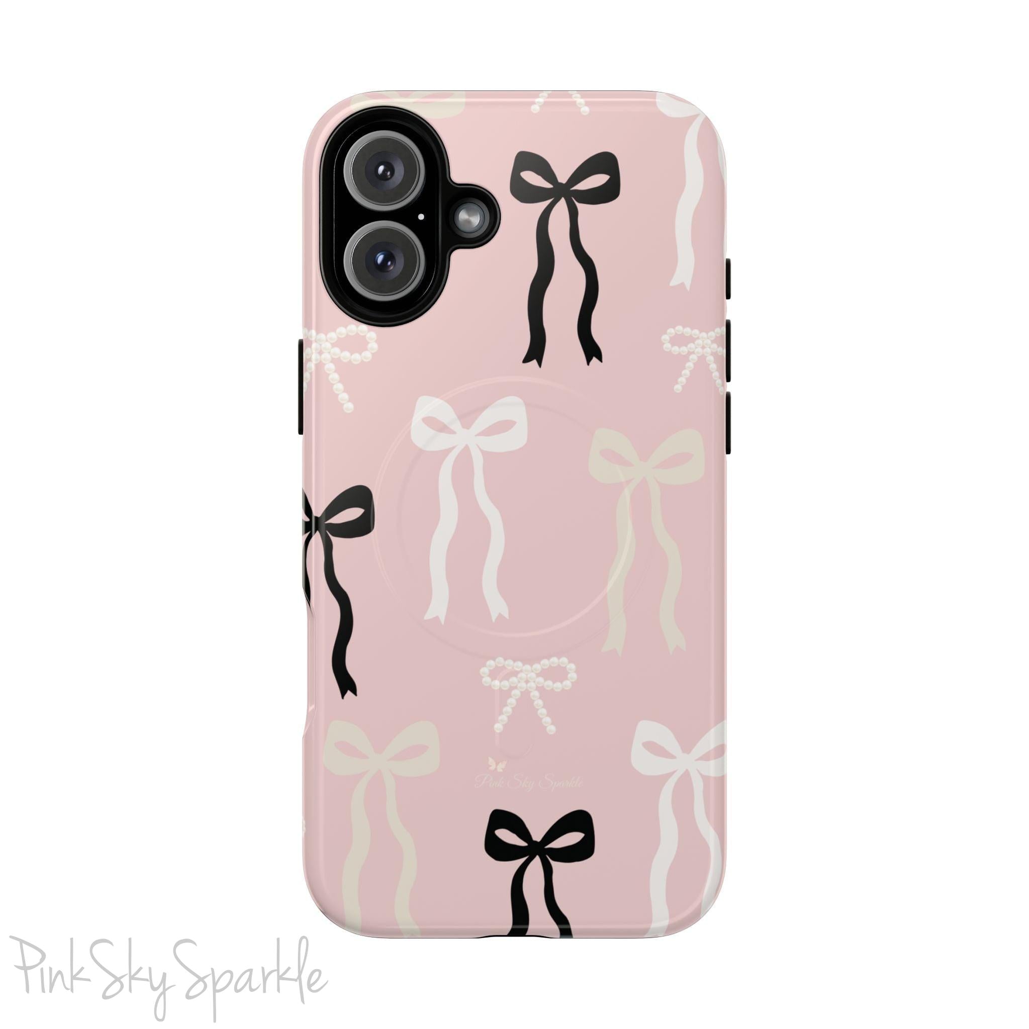 Pink magnetic iPhone case featuring an elegant bow pattern with black, white, and cream bows, designed for MagSafe® compatibility and premium protection.