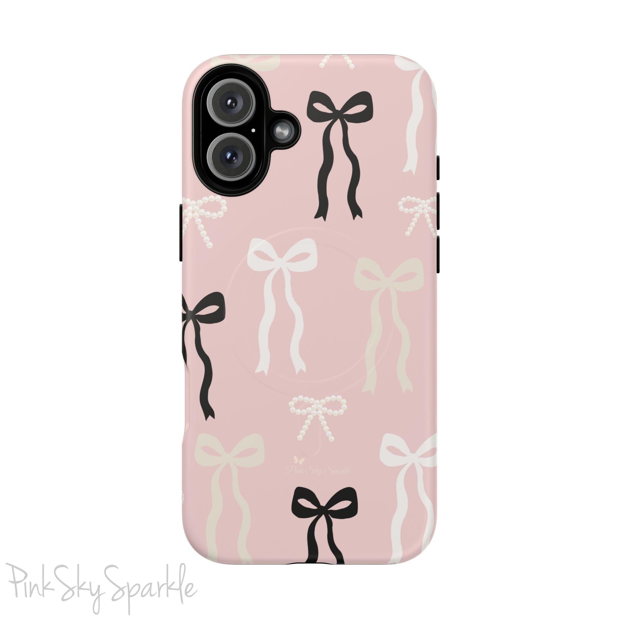Pink magnetic iPhone case featuring an elegant bow pattern with black, white, and cream bows, designed for MagSafe® compatibility and premium protection.