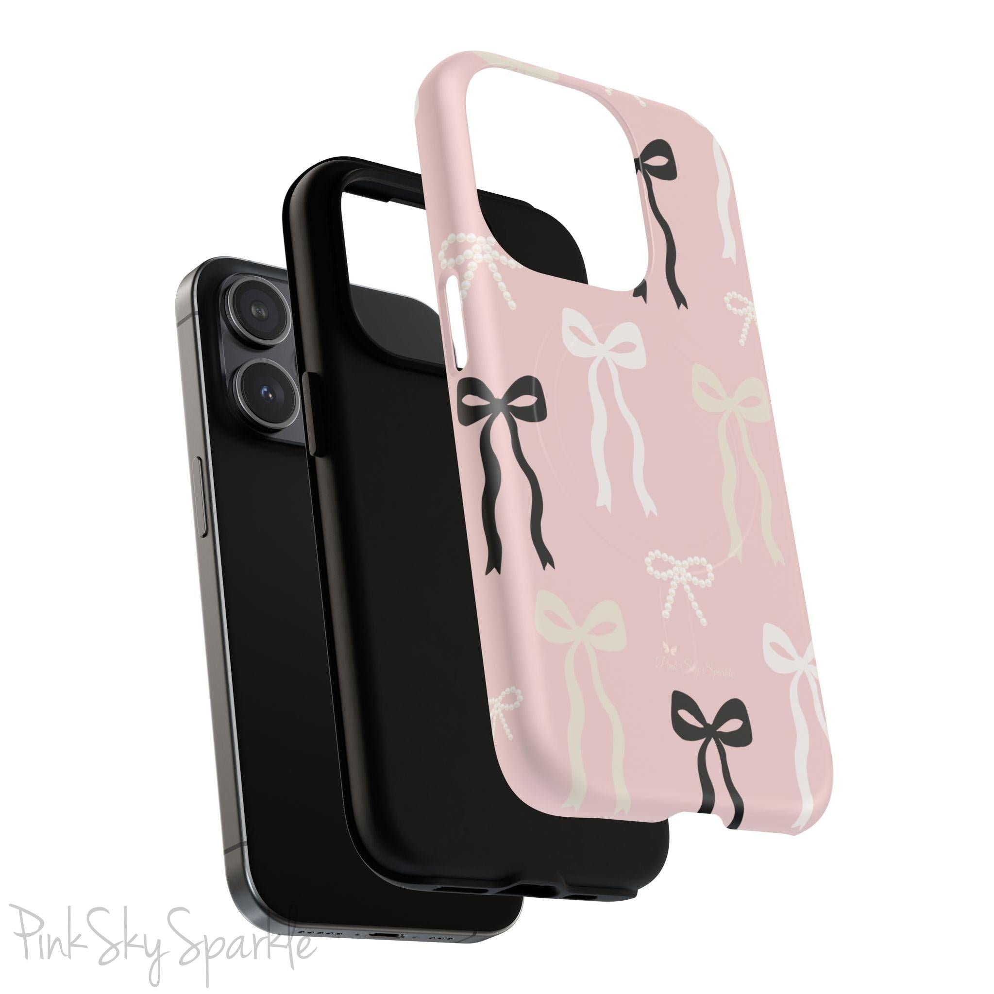 Pink magnetic iPhone case featuring an elegant bow pattern with black, white, and cream bows, designed for MagSafe® compatibility and premium protection.