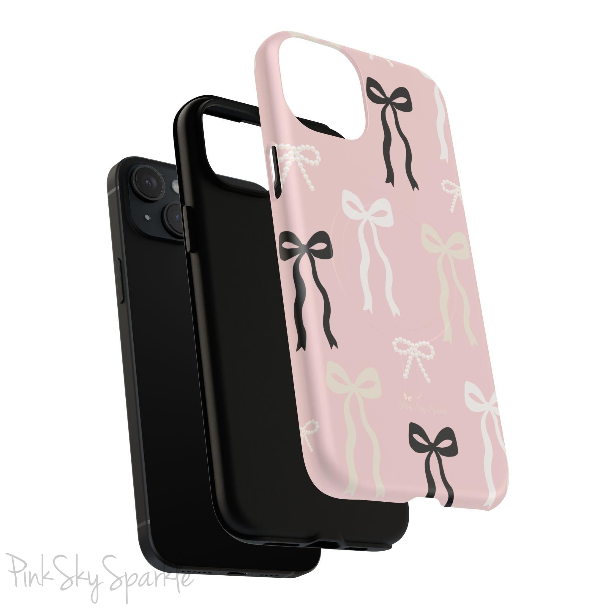 Pink magnetic iPhone case featuring an elegant bow pattern with black, white, and cream bows, designed for MagSafe® compatibility and premium protection.