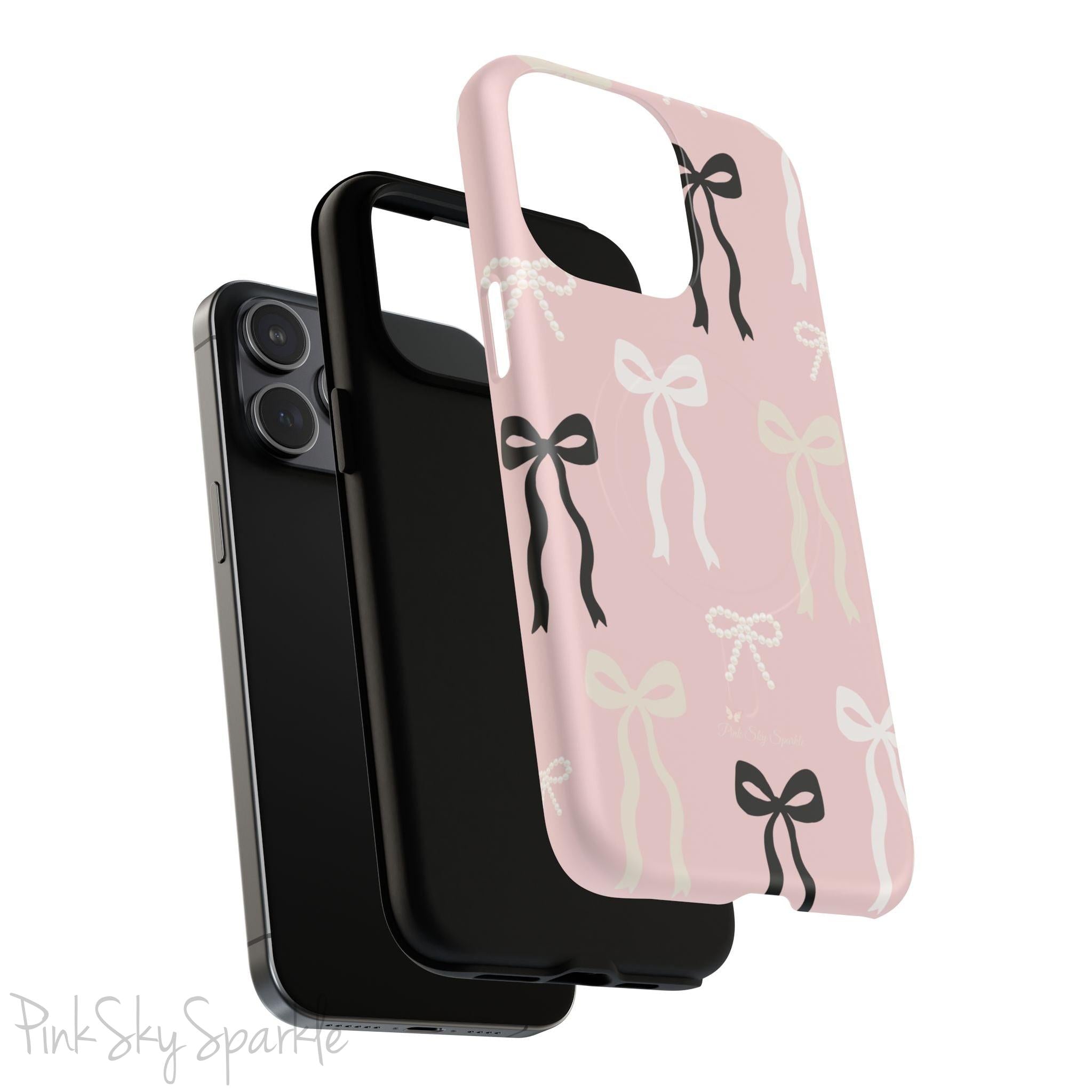Pink magnetic iPhone case featuring an elegant bow pattern with black, white, and cream bows, designed for MagSafe® compatibility and premium protection.