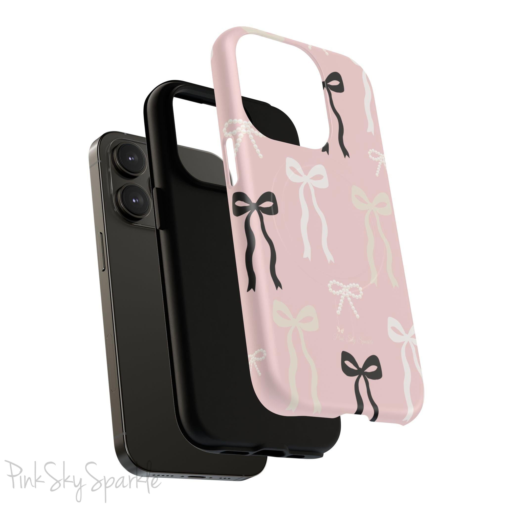Pink magnetic iPhone case featuring an elegant bow pattern with black, white, and cream bows, designed for MagSafe® compatibility and premium protection.
