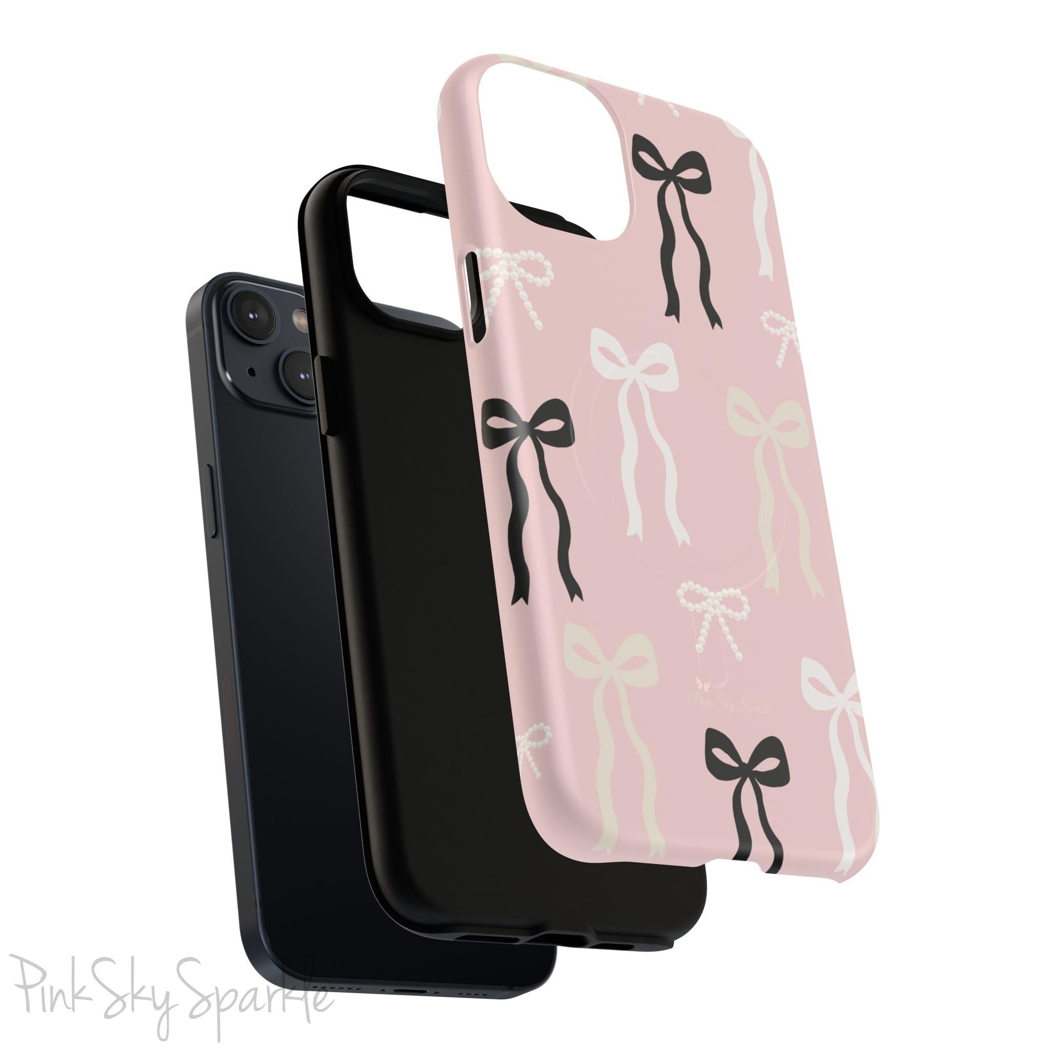Pink magnetic iPhone case featuring an elegant bow pattern with black, white, and cream bows, designed for MagSafe® compatibility and premium protection.