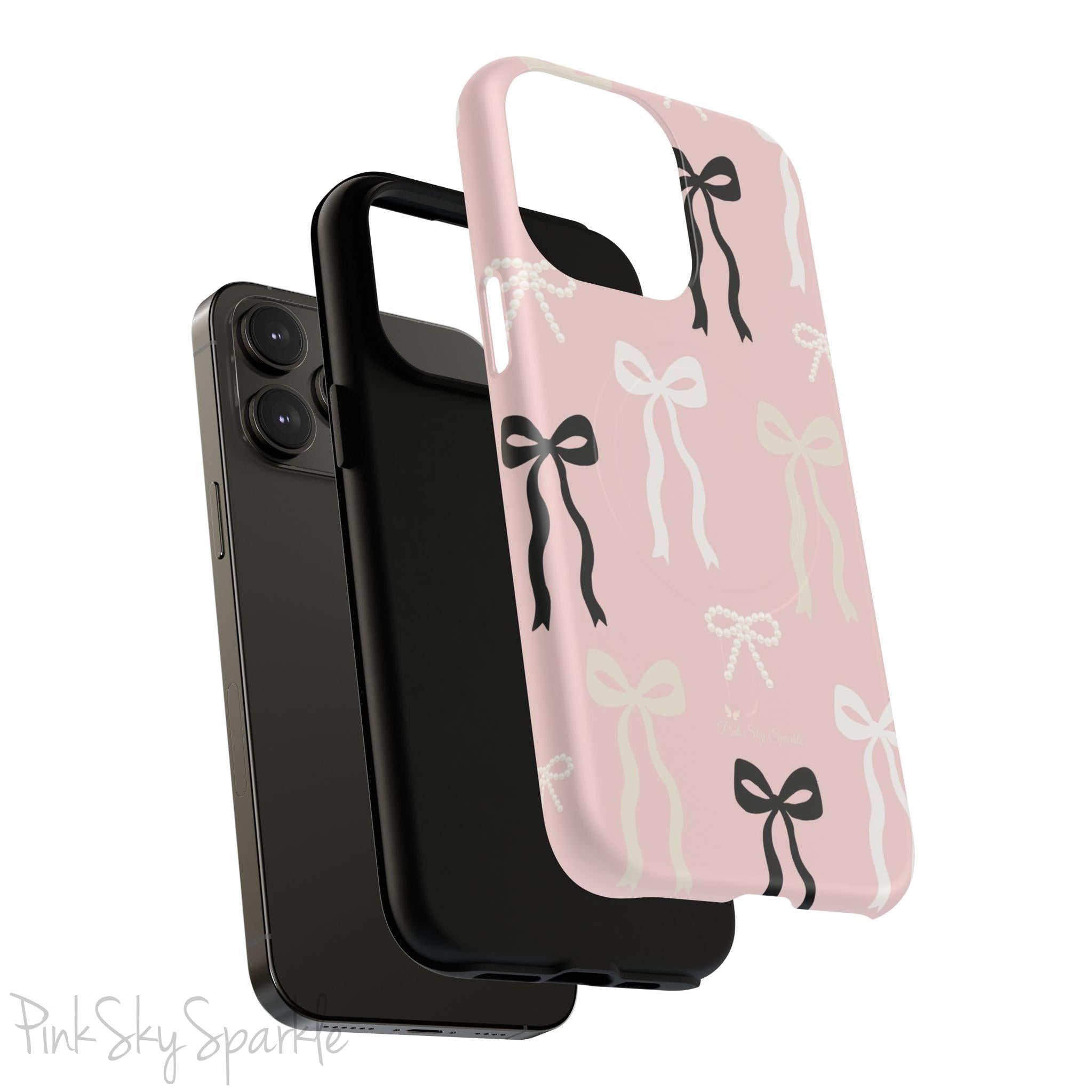 Pink magnetic iPhone case featuring an elegant bow pattern with black, white, and cream bows, designed for MagSafe® compatibility and premium protection.