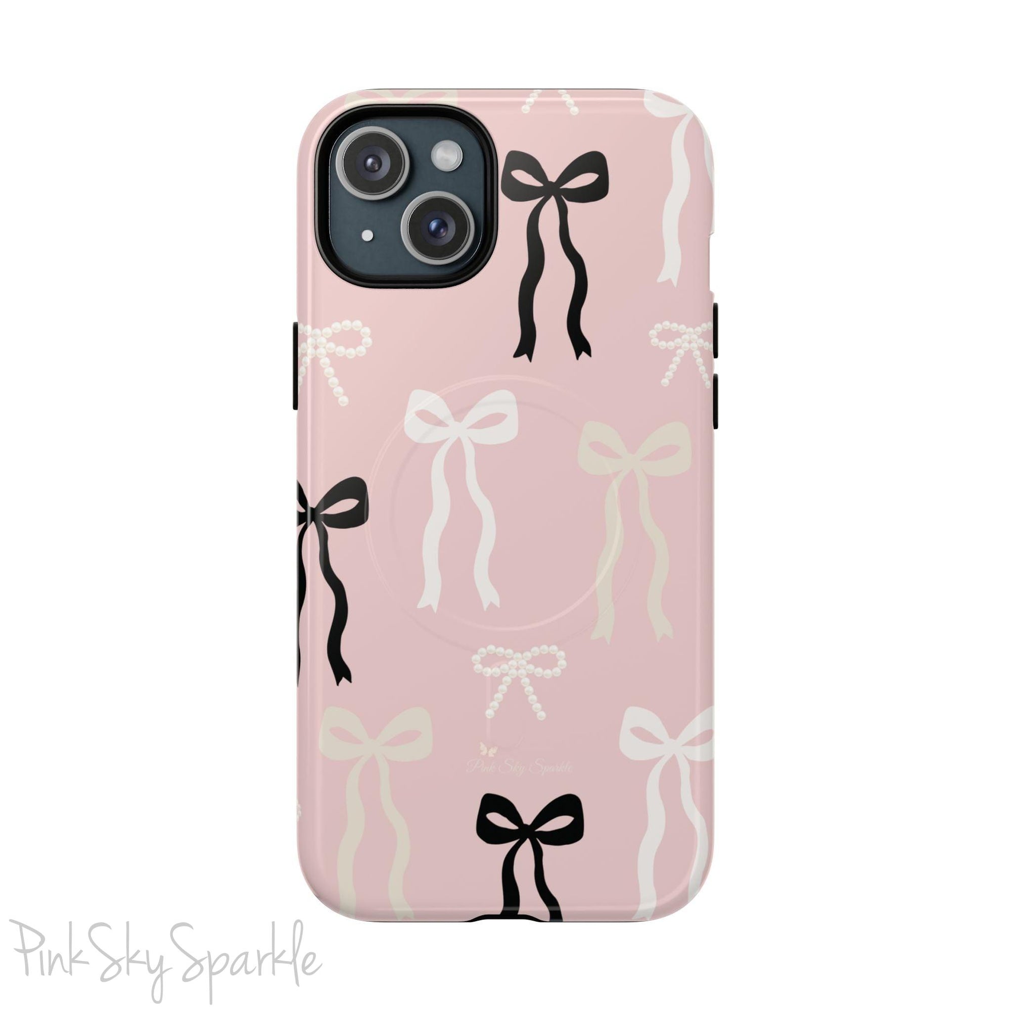Pink magnetic iPhone case featuring an elegant bow pattern with black, white, and cream bows, designed for MagSafe® compatibility and premium protection.