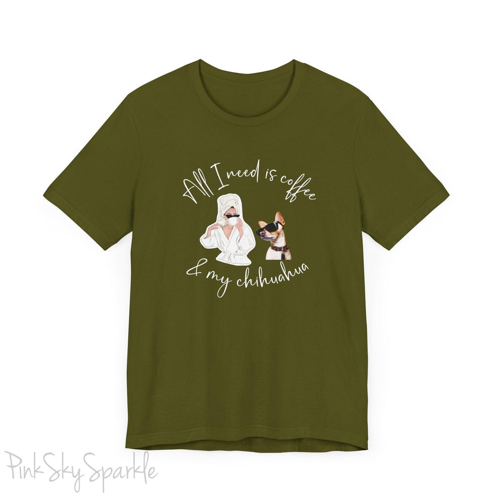 "All I need is coffee and my chihuahua" T-shirt. Featuring a graphic of a woman wearing a robe and hair towel, wearing black sunglasses drinking a coffee next to a chihuahua wearing black sunglasses.