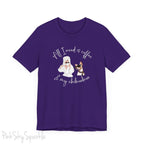 "All I need is coffee and my chihuahua" T-shirt. Featuring a graphic of a woman wearing a robe and hair towel, wearing black sunglasses drinking a coffee next to a chihuahua wearing black sunglasses.