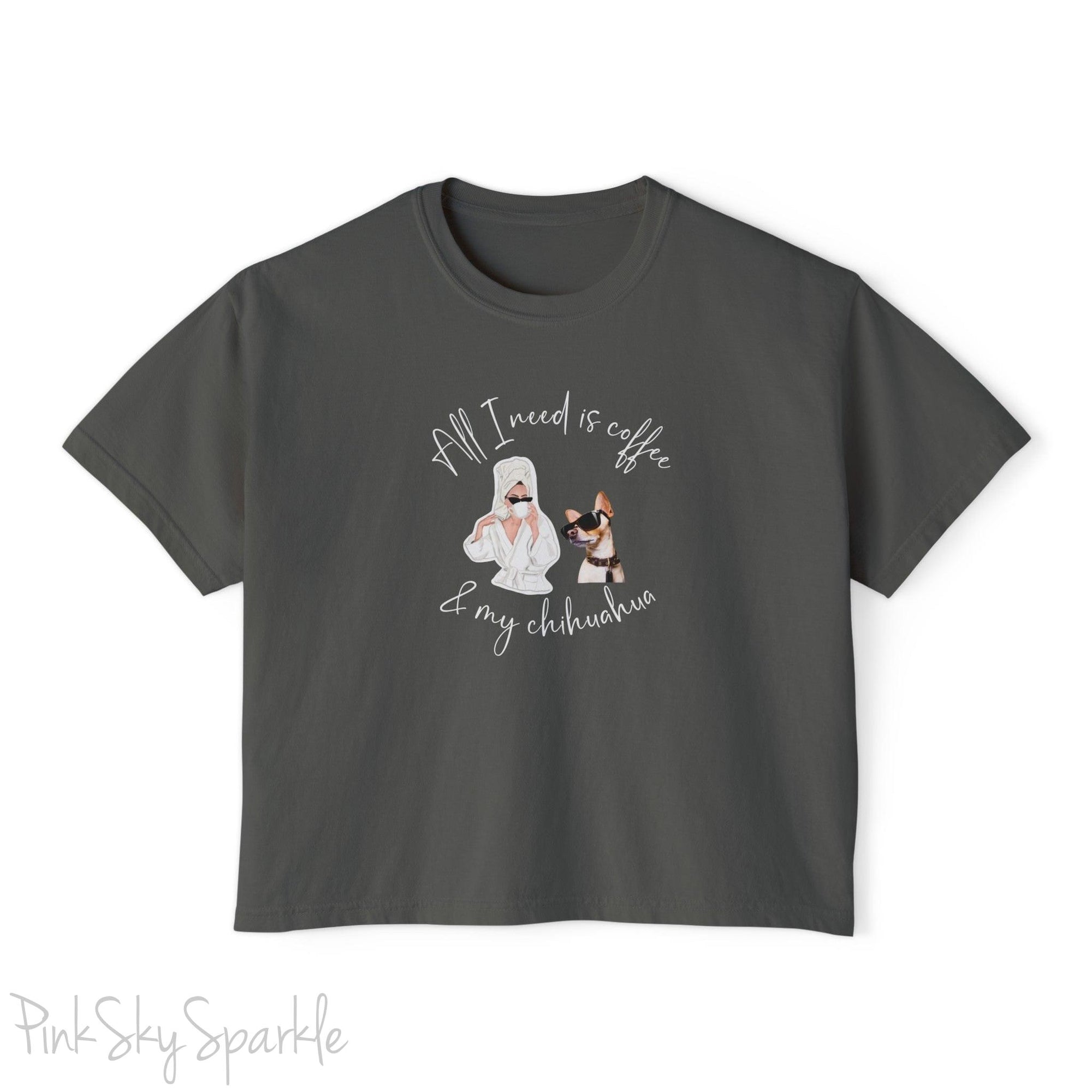 "All I need is coffee and my chihuahua" Women's Boxy Tee. Featuring a graphic of a woman wearing a robe and hair towel, wearing black sunglasses drinking a coffee next to a chihuahua wearing black sunglasses.