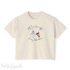 "All I need is coffee and my chihuahua" Women's Boxy Tee. Featuring a graphic of a woman wearing a robe and hair towel, wearing black sunglasses drinking a coffee next to a chihuahua wearing black sunglasses.