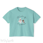 "All I need is coffee and my chihuahua" Women's Boxy Tee. Featuring a graphic of a woman wearing a robe and hair towel, wearing black sunglasses drinking a coffee next to a chihuahua wearing black sunglasses.