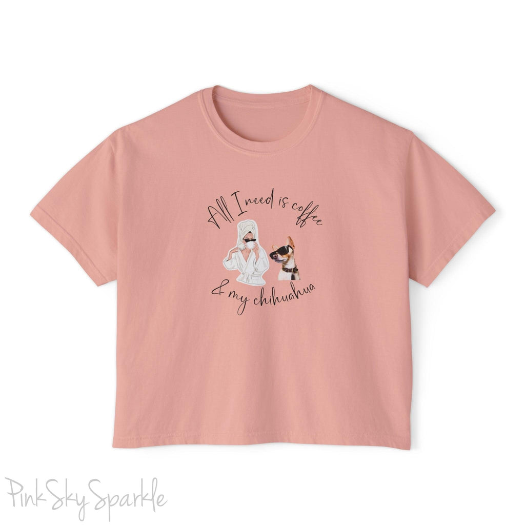 "All I need is coffee and my chihuahua" Women's Boxy Tee. Featuring a graphic of a woman wearing a robe and hair towel, wearing black sunglasses drinking a coffee next to a chihuahua wearing black sunglasses.