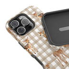 Phone case with deer pattern on a checkered background