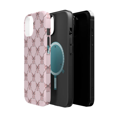 Magnetic iPhone case with a pink background and ballet-inspired pink bows, perfect for adding a touch of elegance and charm to your phone.