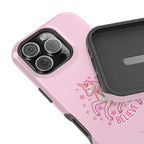 Pink phone case with unicorn design and 'BELIEVE' text on a white background