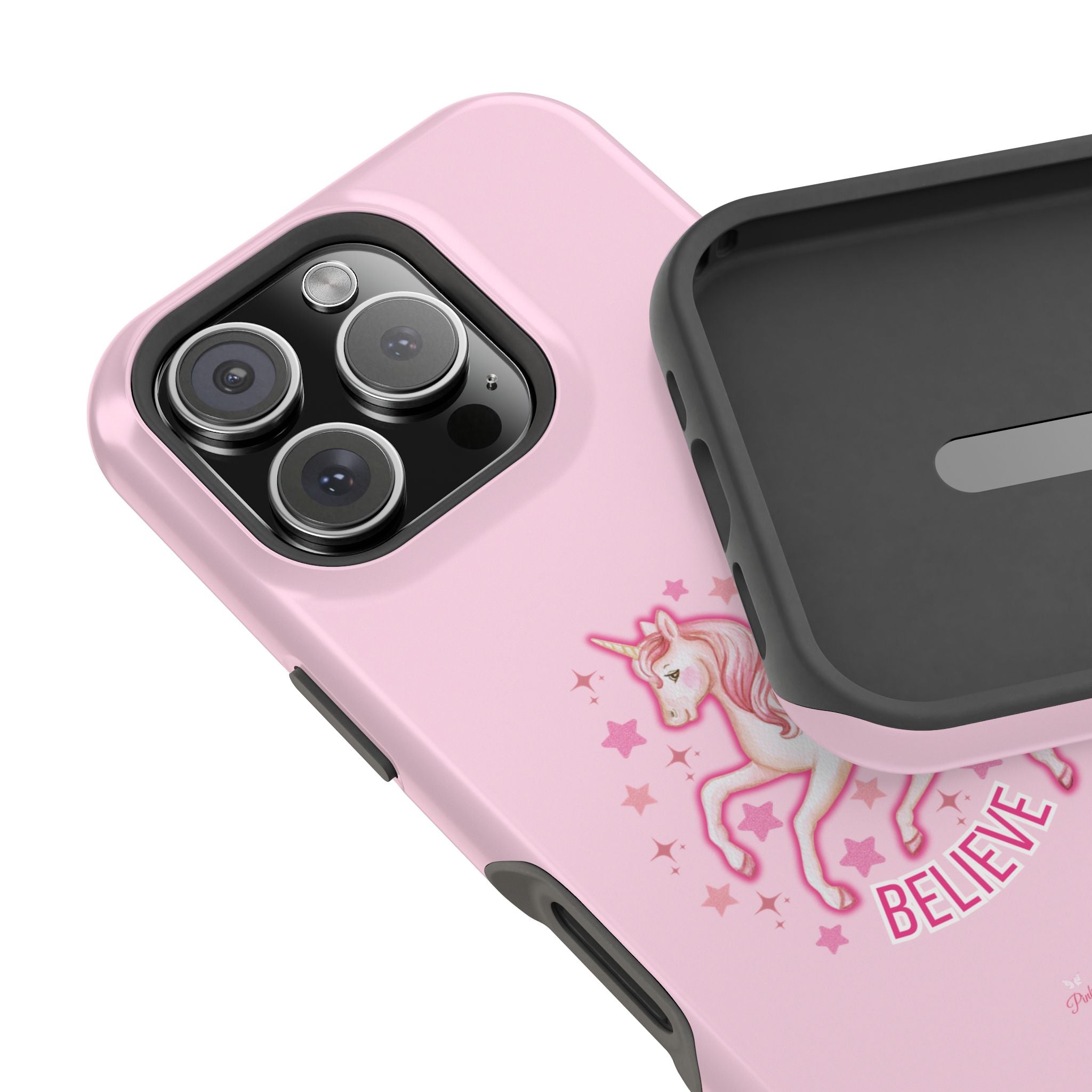 Pink phone case with unicorn design and 'BELIEVE' text on a white background