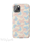 Butterfly Slim iPhone Case. Featuring a neutral background with a pattern of light pink and light blue butterflies.