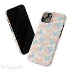 Butterfly Slim iPhone Case. Featuring a neutral background with a pattern of light pink and light blue butterflies.