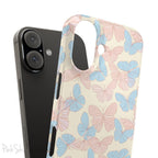 Butterfly Slim iPhone Case. Featuring a neutral background with a pattern of light pink and light blue butterflies.