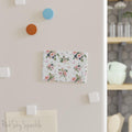 Butterfly Garden Rectangle Button Magnet - Delicate and enchanting magnet featuring a whimsical garden scene with pink butterflies and floral accents. Perfect for fridge decor, gifting, and nature lovers.
